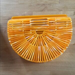 Francesca's Collections Orange Bamboo Clutch